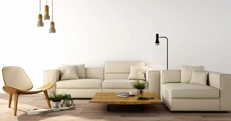 Although using bigger furniture pieces seems contradicting to your goal of saving space, it actually gives a sense of grandeur.
